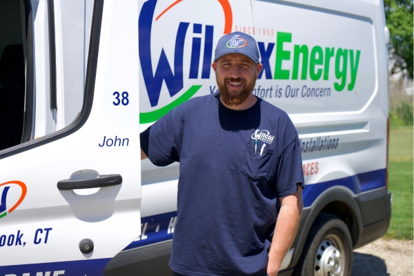 Wilcox Energy professional HVAC technician and service van