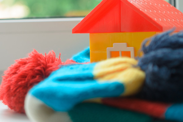 image of a home covered in a scarf for home heating