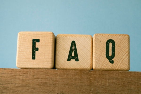 FAQ spelled using wooden letter cubes depicting How Does AC Remove Humidity questions