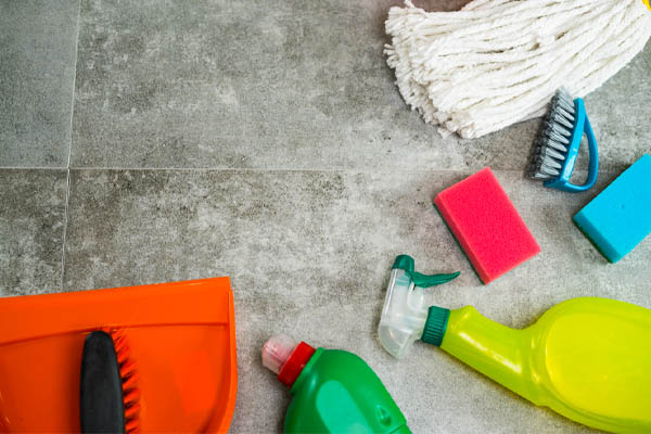 image of homeowner using disinfectant to clean HVAC ductwork