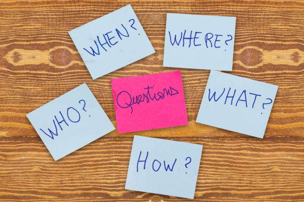 Questions - Why What Where When Why How written on sticky notes depicting MERV Ratings FAQs
