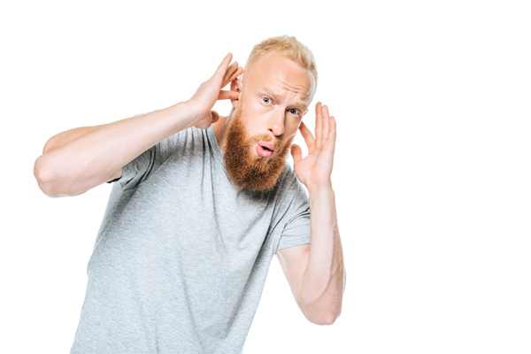 image of man experiencing loud air conditioner noises