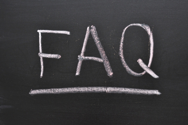 FAQ written on a chalkboard depicting questions about air conditioner SEER ratings