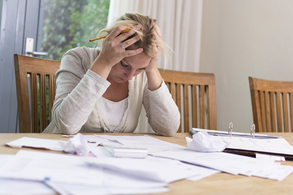 woman with financial problems due to high cost of electrification