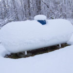 image a home propane tank in the snow depicting does propane freeze