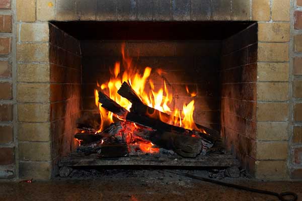 image of soot around a wood fireplace