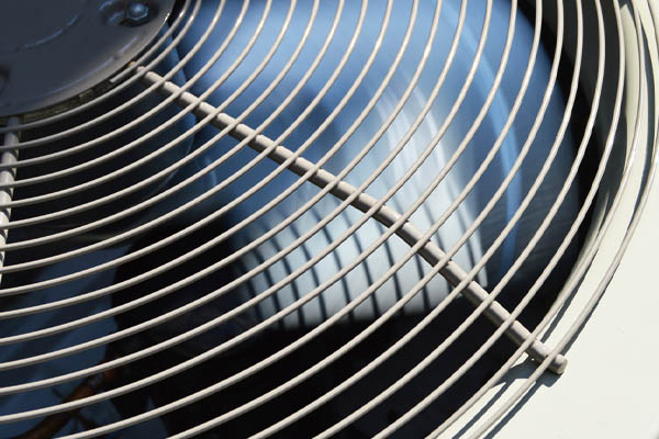 image of an air conditioner fan depicting a modulating air conditioner compressor