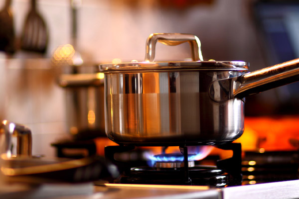 image of a pot on a propane stove depicting cooking with propane and tips