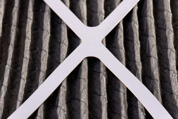 image of a dirty hvac filter that needs a replacement for heating system efficiency