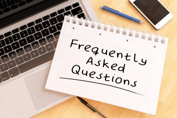 Frequently Asked Questions written on a notebook depicting FAQs about summer propane tips