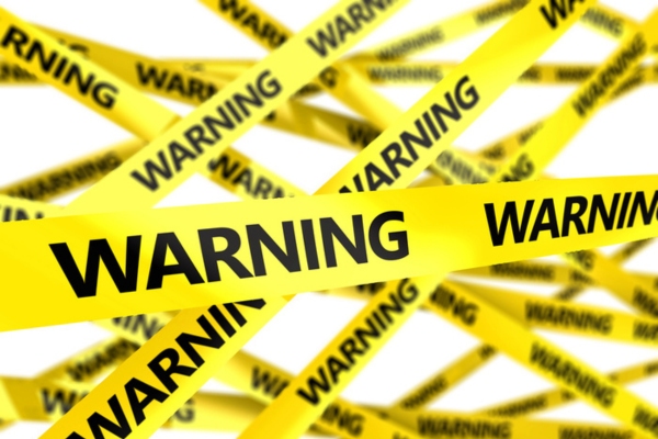 warning yellow tape depicting signs of an inefficient Air Conditioner
