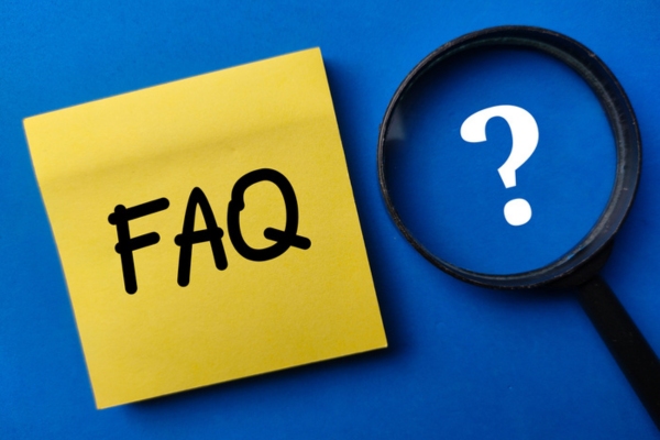 FAQ on a sticky note beside a magnifying glass depicting questions about HVAC Ductwork Replacement