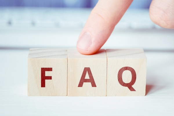 FAQ spelled using wooden letter cubes depicting questions About Hot Water Radiator