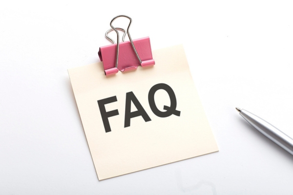 FAQ written on a card with a metal clip depicting questions about Furnace Noise