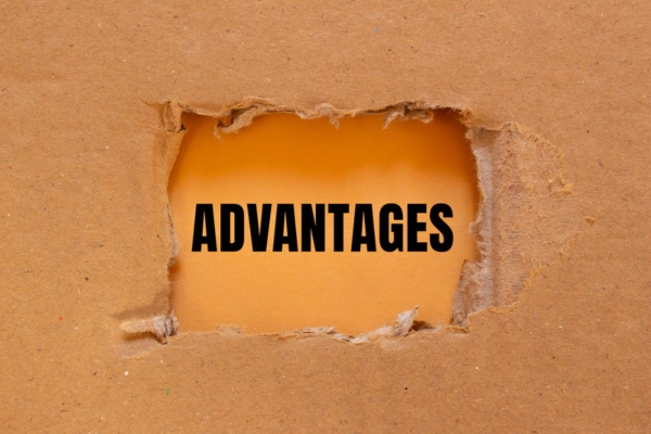 advantages revealed from a torn cardboard depicting Heating Oil and Hot Water Radiators