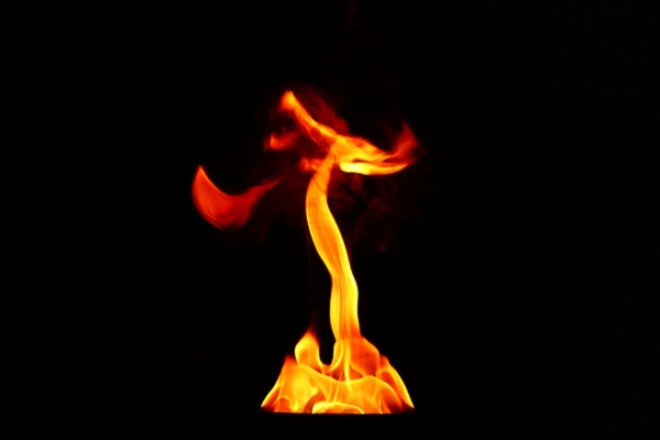 flame on black background depicting furnace pilot light