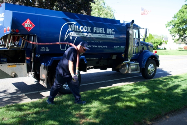 Wilcox Energy oil delivery truck and staff