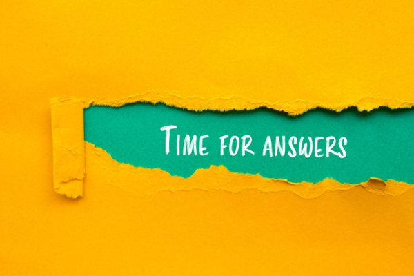 Time for answers message written on ripped torn yellow paper depicting Air Conditioning Safety FAQs