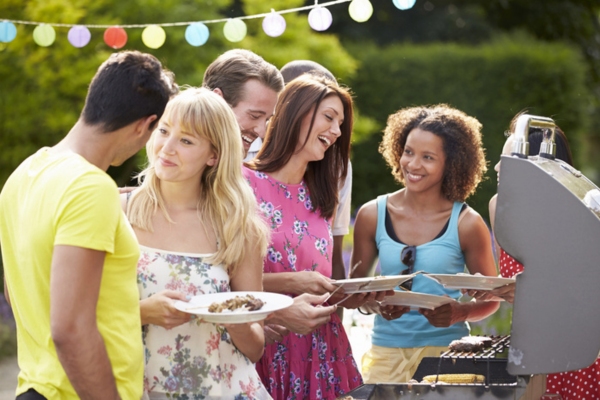 friends having outdoor barbecue