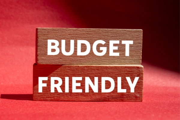 Budget friendly written on a wooden bar depicting heating oil