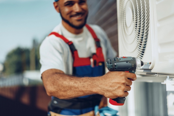 technician about to perform AC inspection